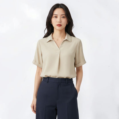 OnenessU beige short-sleeve blouse in recycled polyester with a minimalist collar and relaxed fit worn by a model.